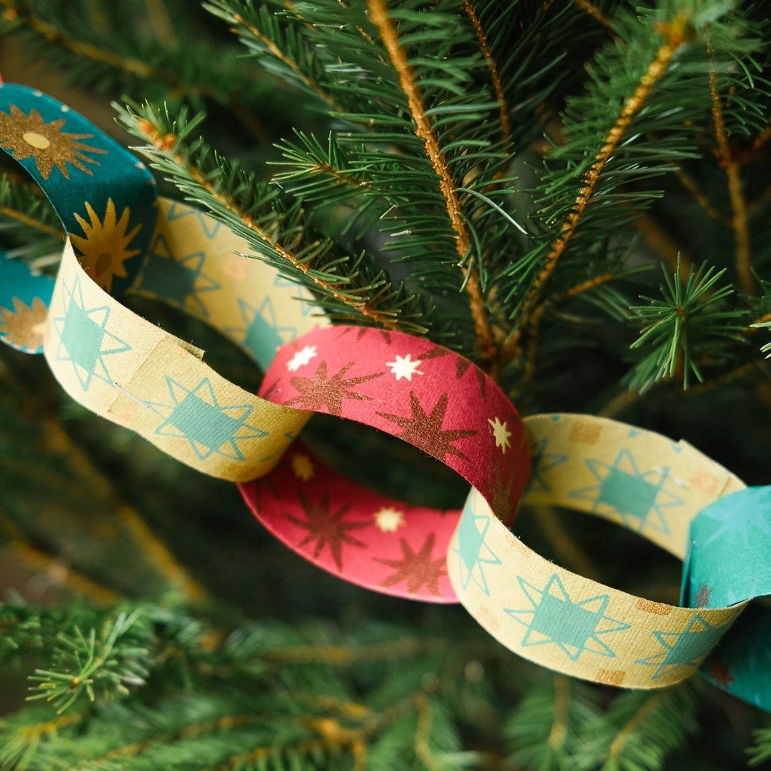 East End Press Festive Paper Chain Kit on a tree at Addison West
