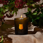 Trudon Cyrnos "Mediterranean Aromas" Petite Candle on a beige background at Addison West
