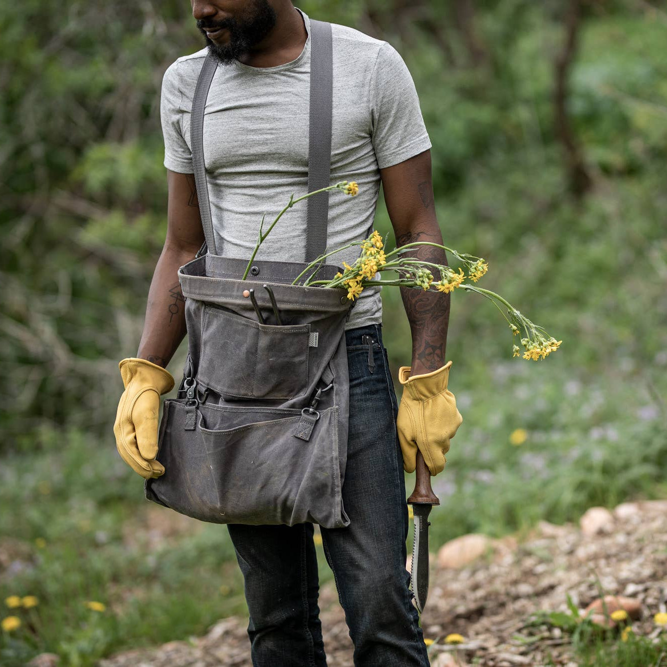 Barebone Hori Hori Ultimate with Sheath held by a man at Addison West