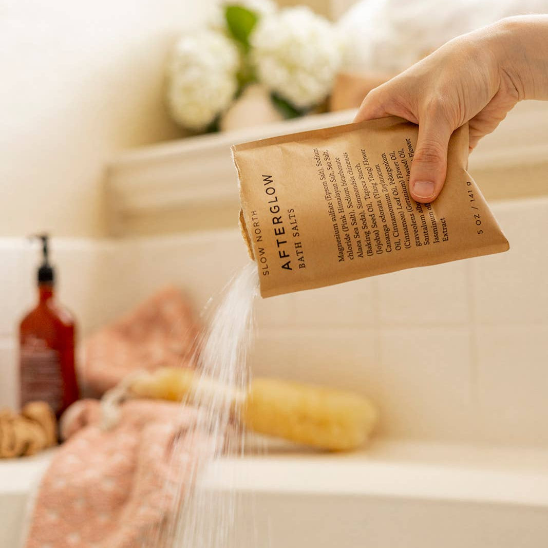 Afterglow Bath Salts being poured into a bath at Addison West