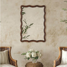 Mirelle Accent Mirror on a beige wall in a living room at Addison West