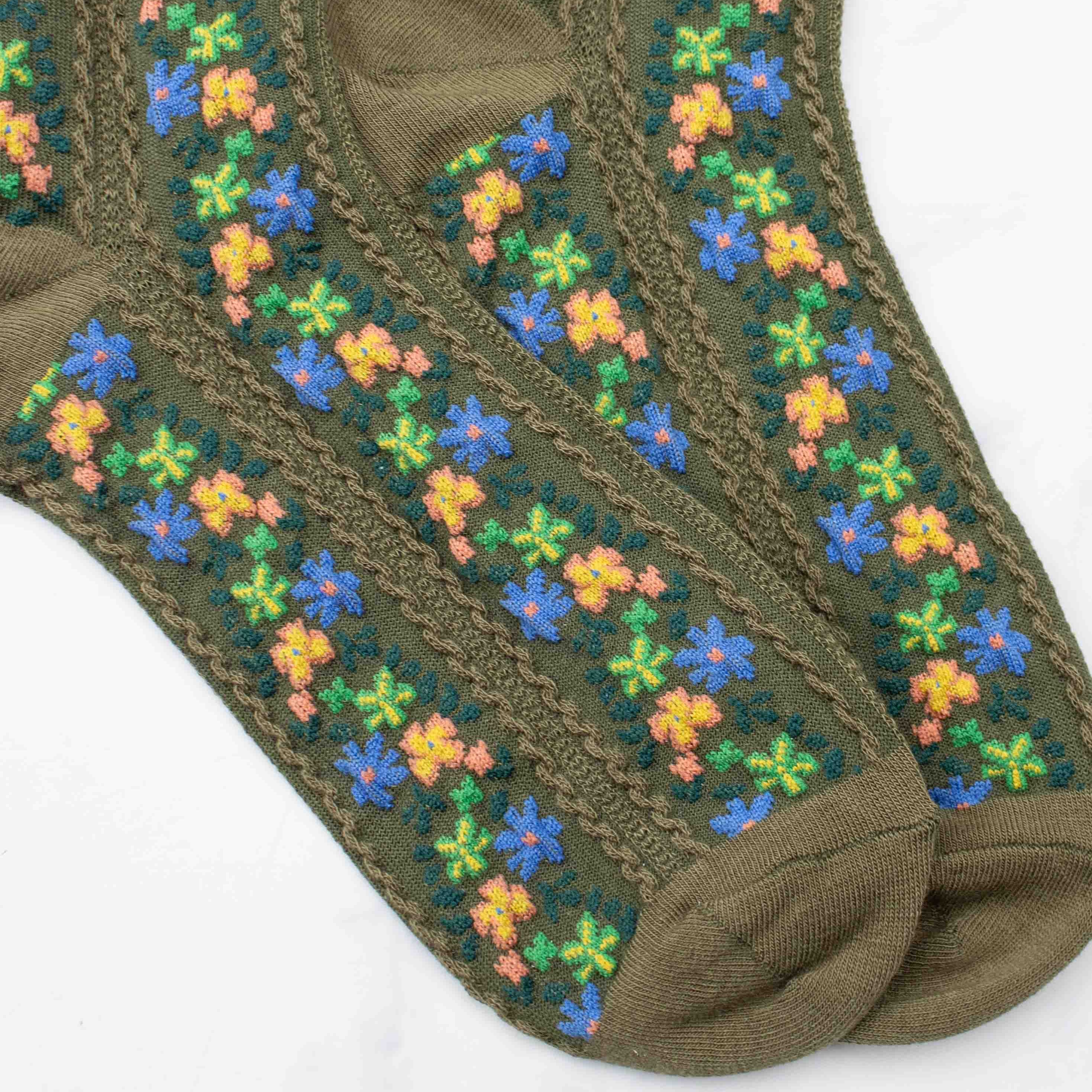 Aahana Floral Socks in Olive on a white background at Addison West
