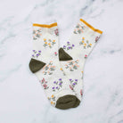 Penelope Floral Socks in Cream and Mustard on a white background at Addison West