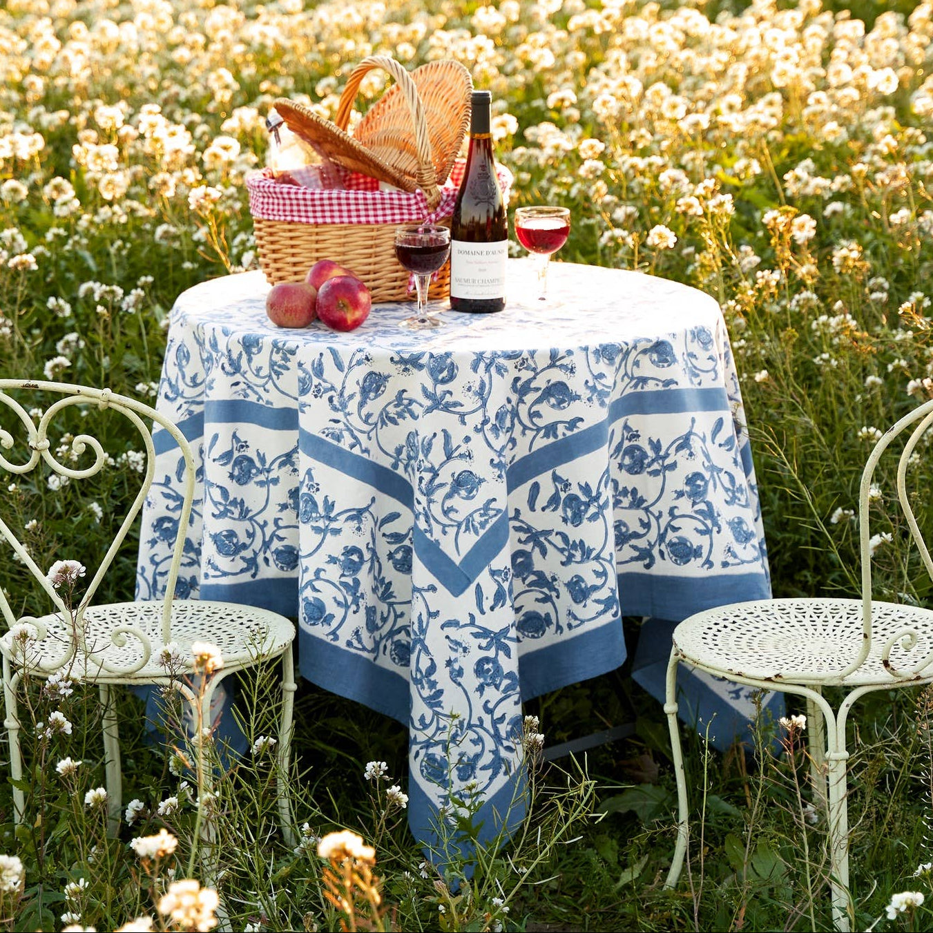 Granada Cornflower Tablecloth 59" x 59" on a table at Addison West