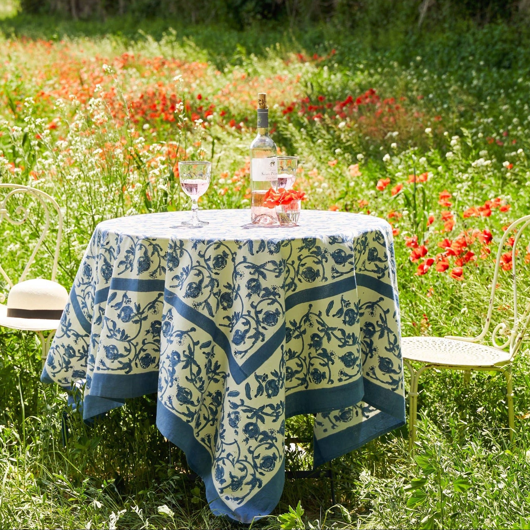 Granada Cornflower Tablecloth 59" x 59" on a table at Addison West