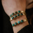 Commonform Bridger Cuff in Turquoise on model at the Addison West.