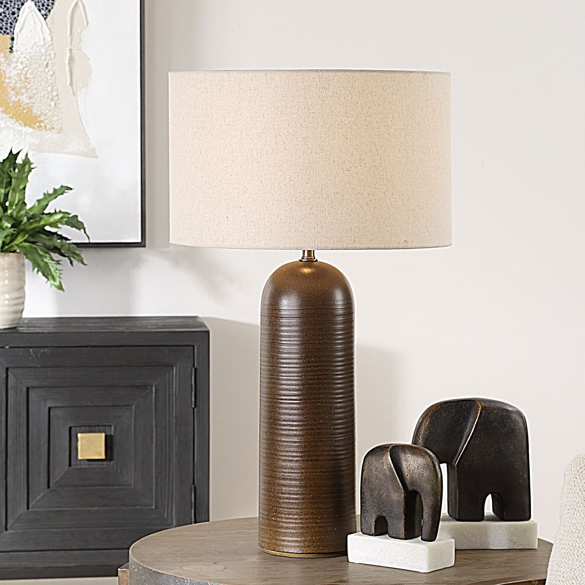 Trevan Table Lamp on a table at Addison West
