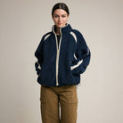 Contrast Trim Sherpa Zip-Up Jacket in Navy on a model at Addison West