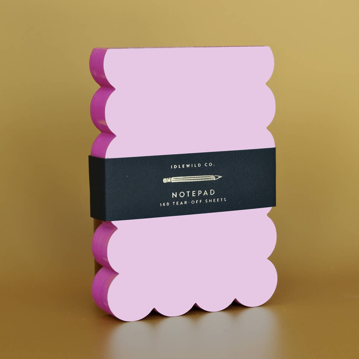 Scalloped Shaped Notepad in Lilac And Hot Pink on a beige background at Addison West