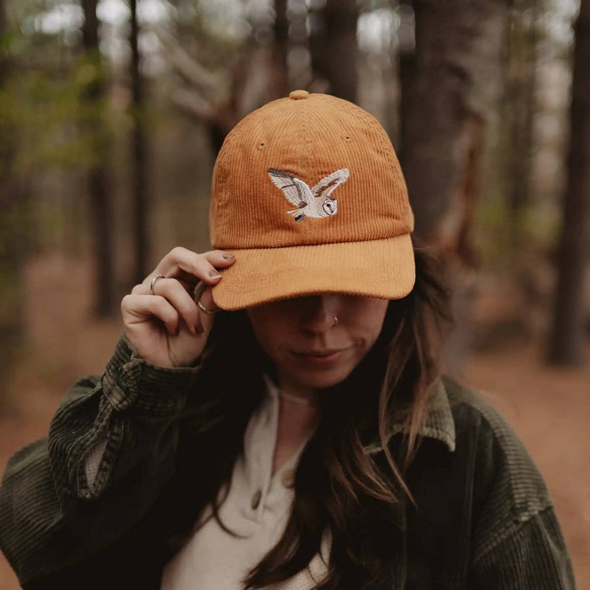 Barn Owl Corduroy Hat in Amber on a model outside at Addison West