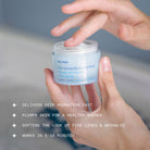 Vital Spring Hydration Mask held by a model at Addison West