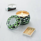 Roland Pine Small Tin Soy Candle on a grey background at Addison West