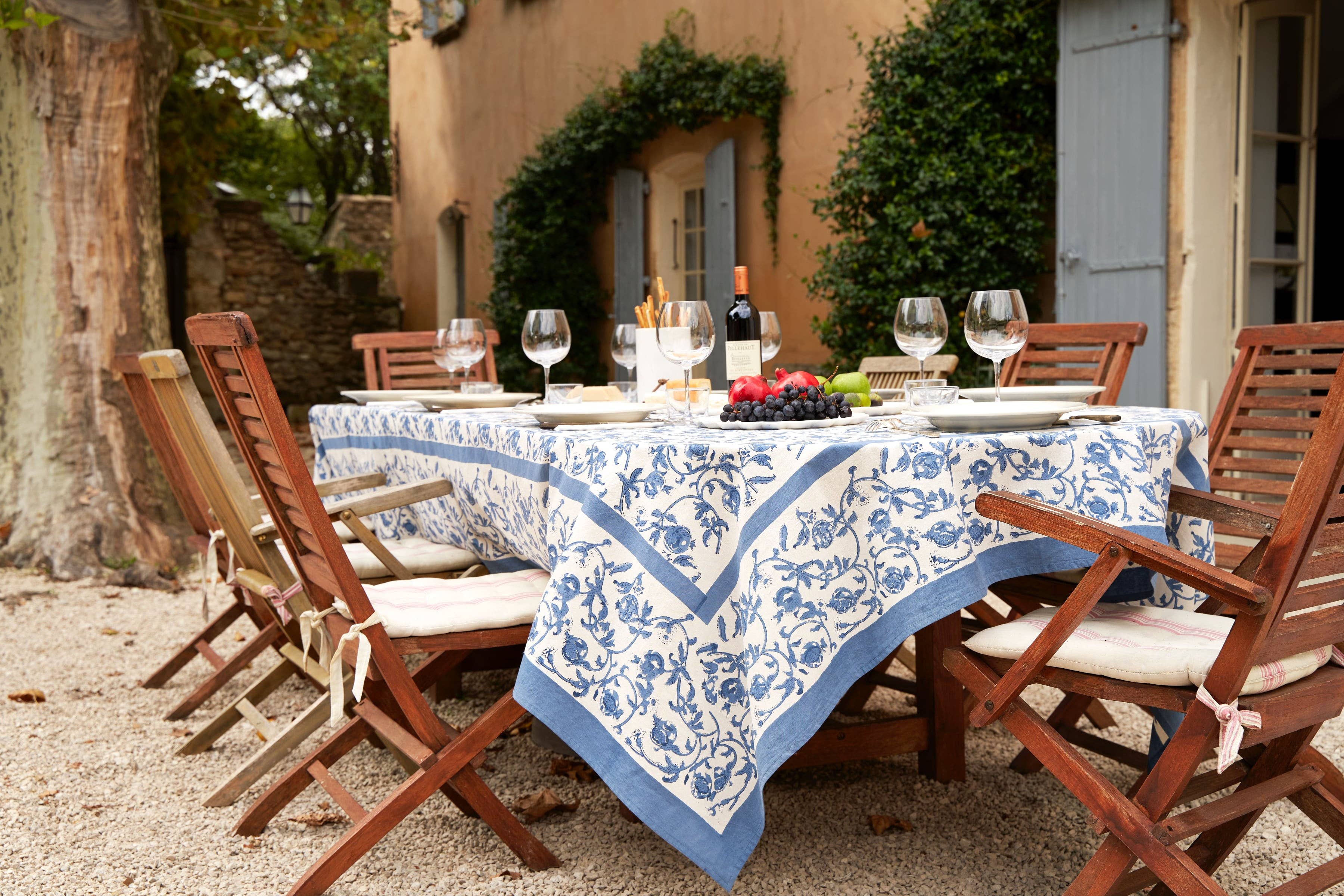 Granada Cornflower Tablecloth 59" x 59" on a table at Addison West