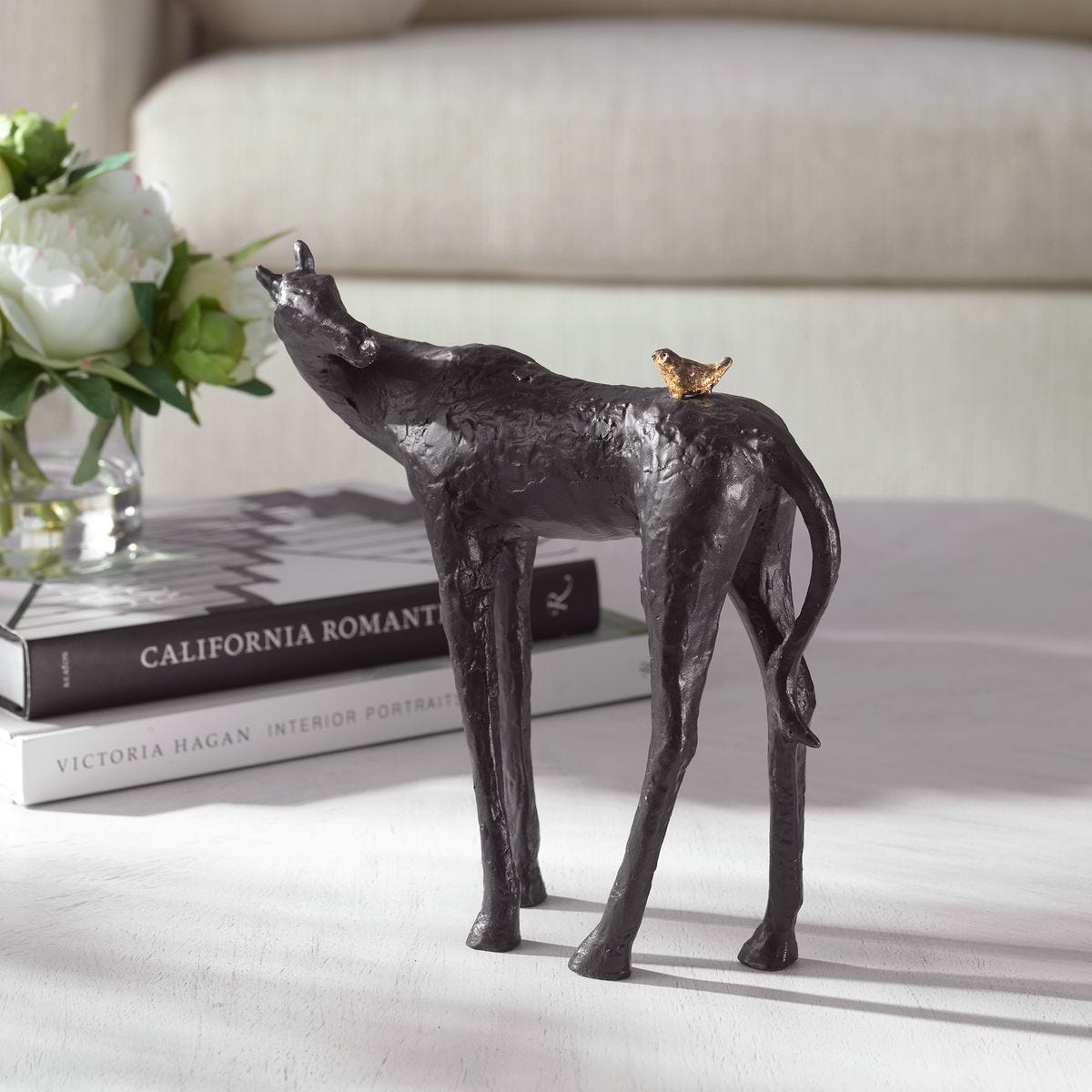Horse and Bird Sculpture on a table at Addison West