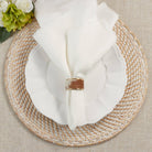 Cow Hide Napkin Rings, Set of 4 on a table at Addison West