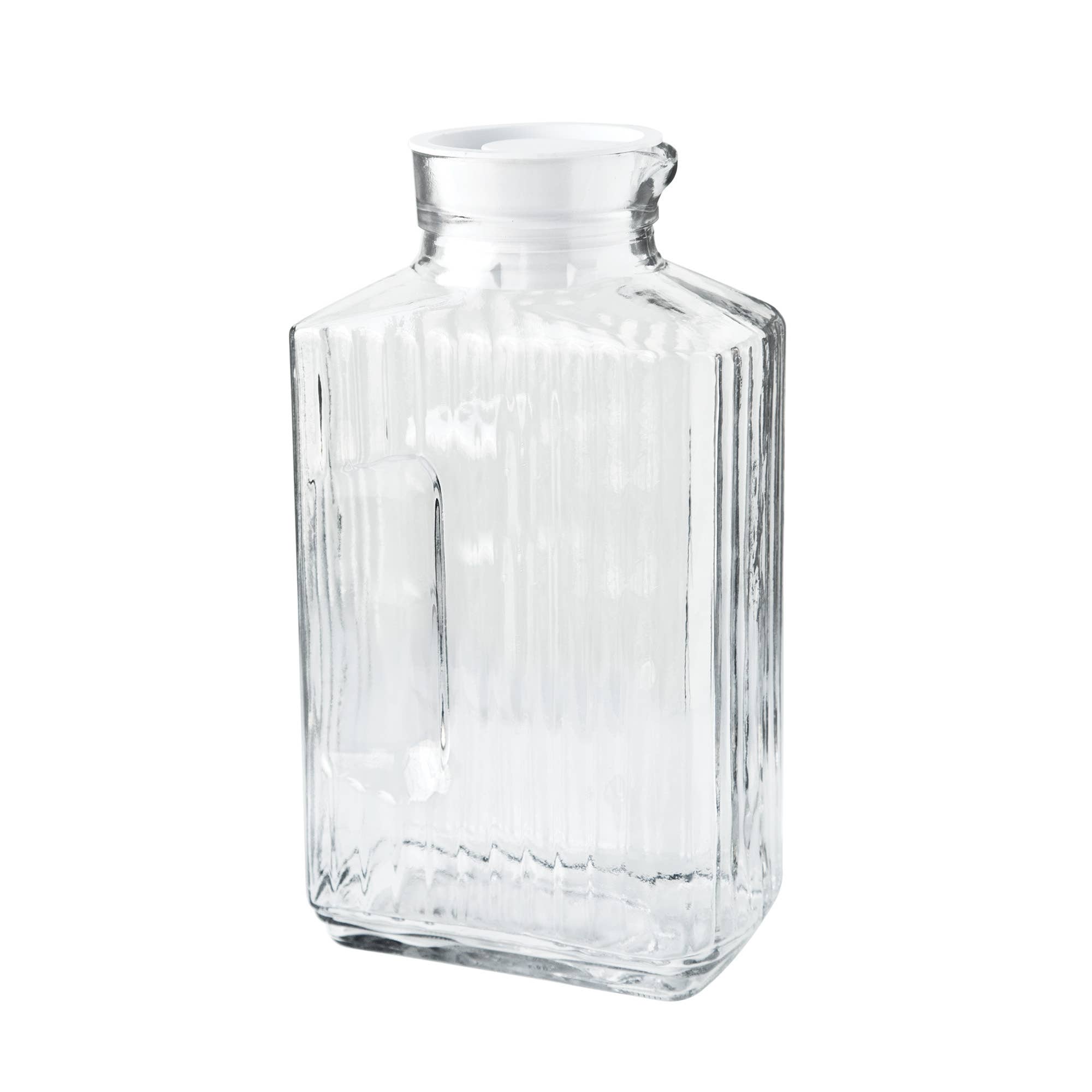 Clear glass vase with textured surface on a white background
