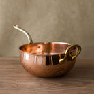 Galley and Fenn Copper Colander on a wood table at Addison West