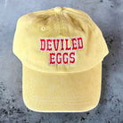 Deviled Eggs Baseball Hat on a grey background at Addison West