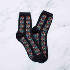 Aahana Floral Socks in Black on a white background at Addison West