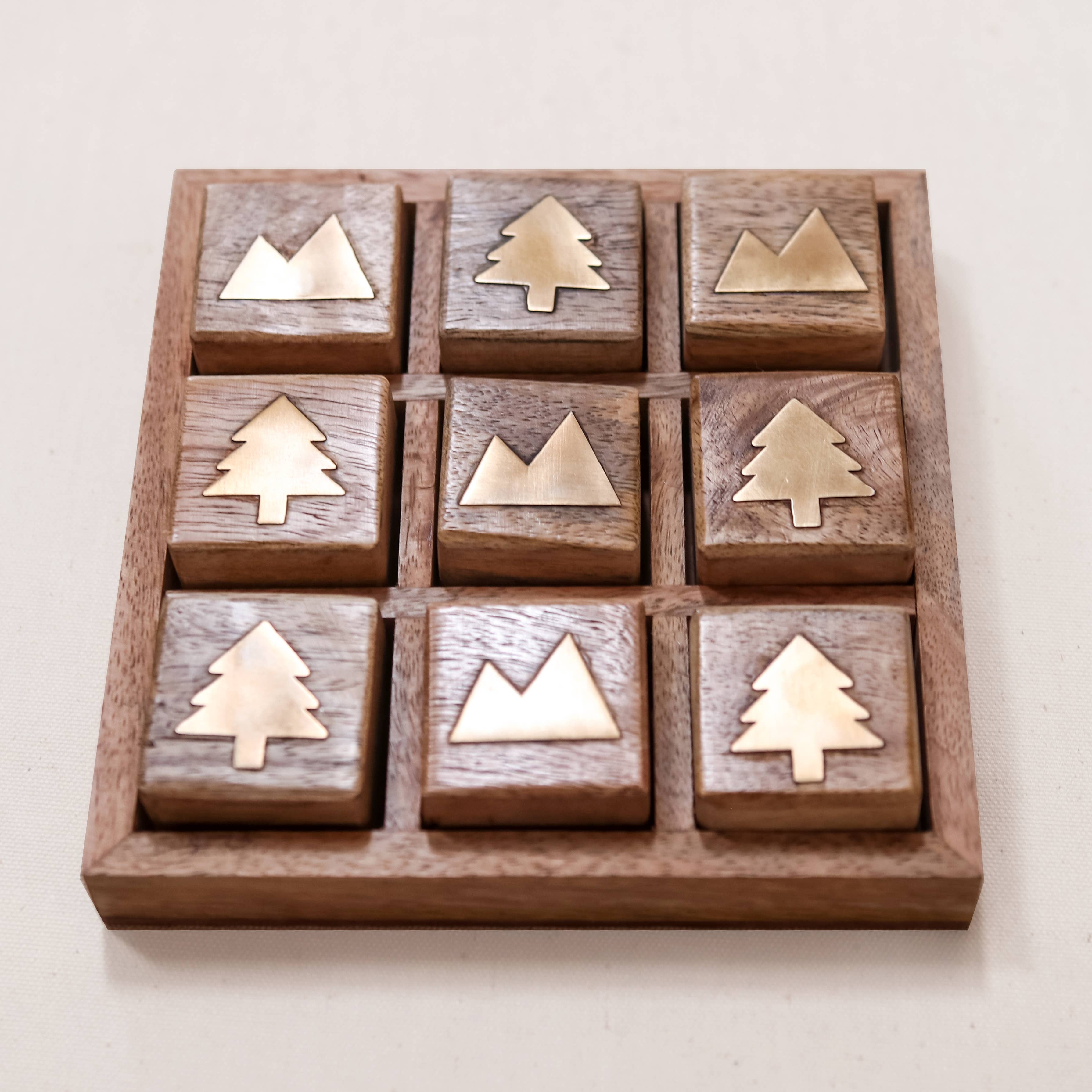 Mountain vs. Trees Tic Tac Toe Board on a white background at Addison West