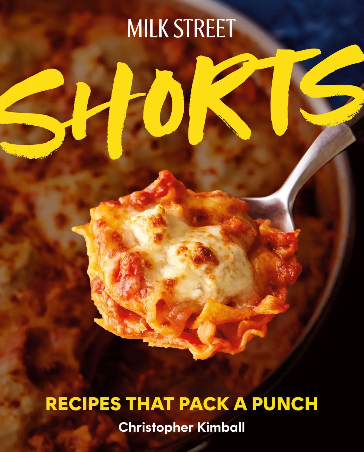 Book cover of 'Milk Street Shorts' with a spoonful of pasta and cheese on a dark background.