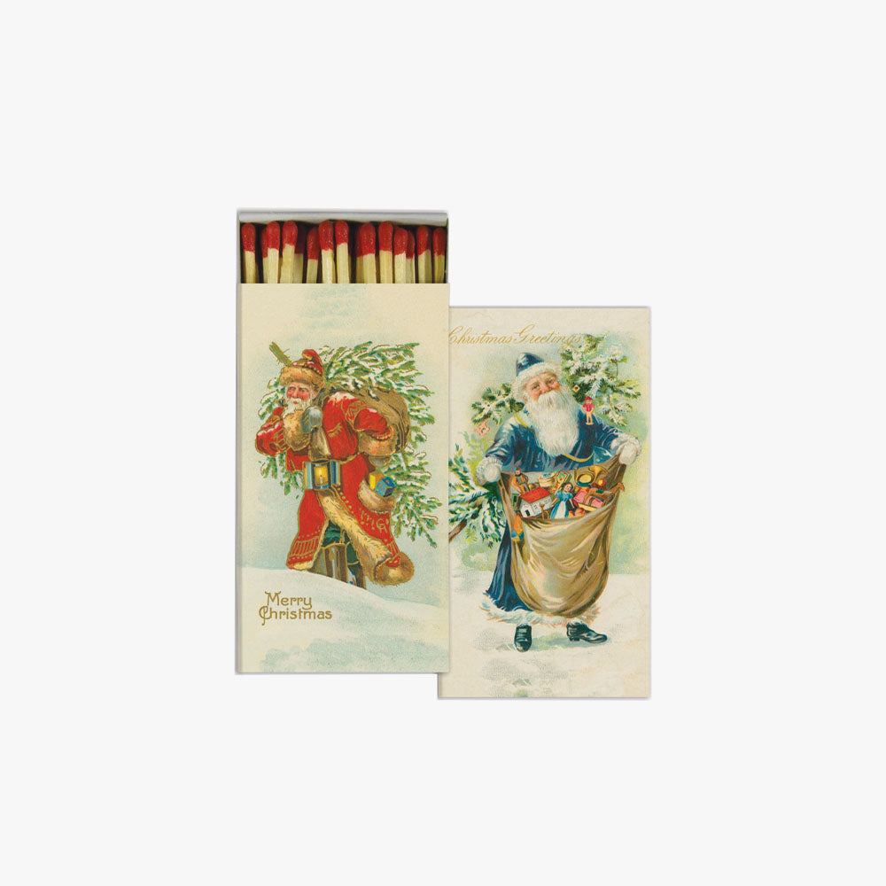 Box of matches with vintage style illustration of santa on front and back