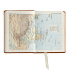 The Traveler's Atlas Cognac Leather on white background at Addison West.
