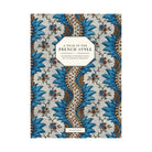 A book cover for 'A Year in the French Style: Interiors & Entertaining by Anthony Poelge' featuring a detailed botanical pattern in blue, brown, and beige, with a cream-colored title label.