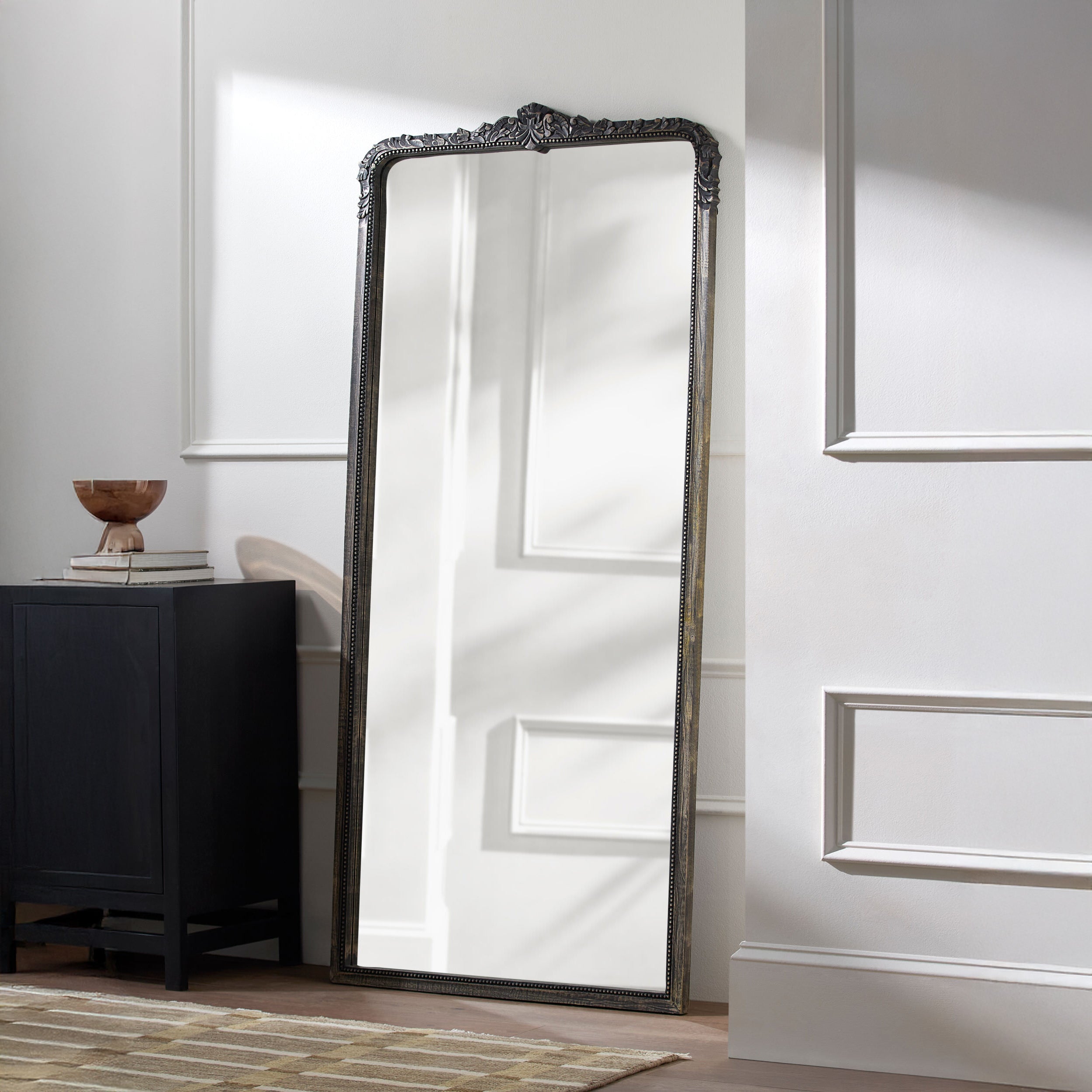Aaliyah Full Length Mirror in Natural Black in a white room at Addison West