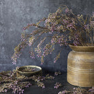Abigail Ahern Artificial Berry Branch in Lilac on a grey background at Addison West