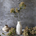 Abigail Ahern Faux Butterfly Bush in Natural on a grey background at Addison West