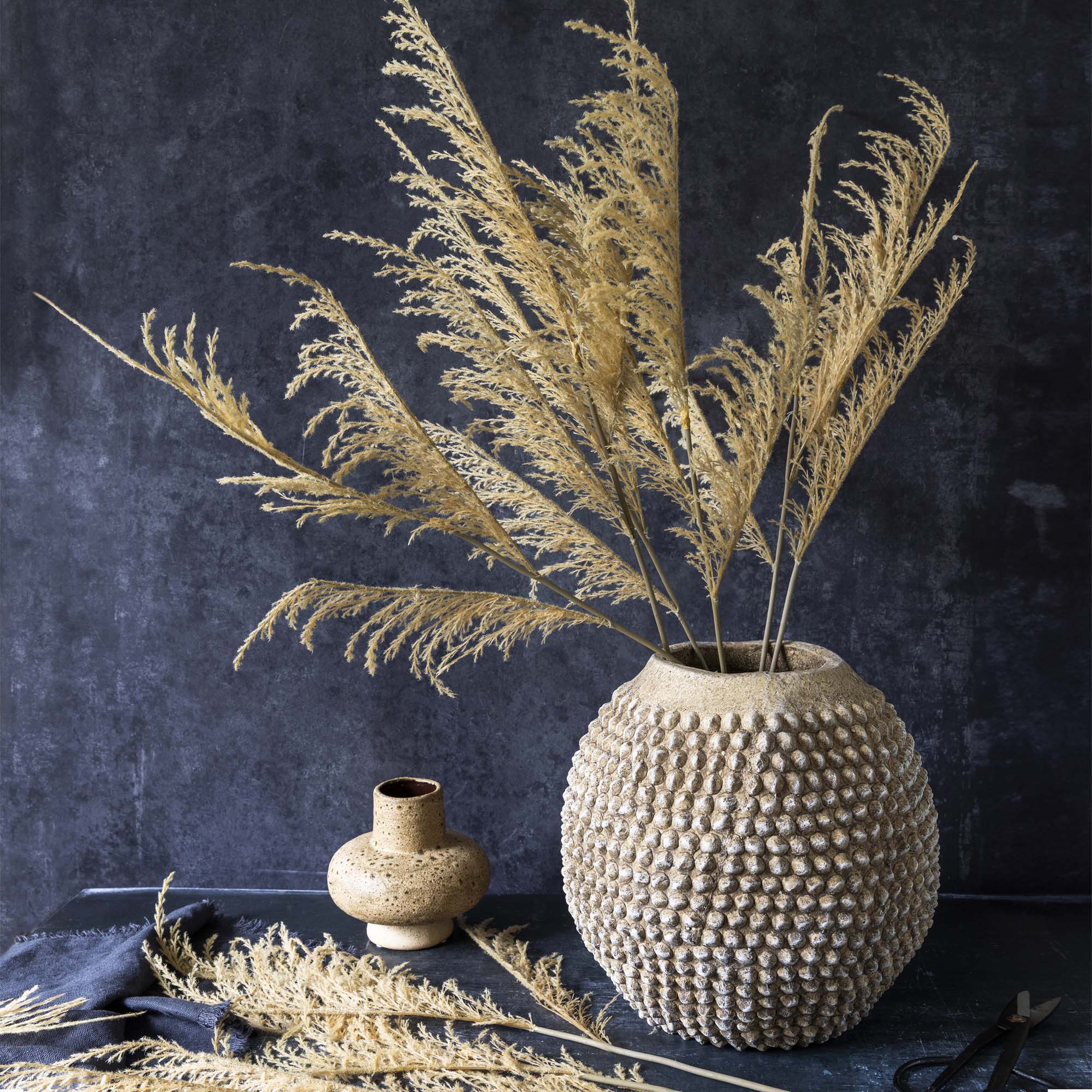 Abigail Ahern Faux Wild Grass in Oat on a grey background at Addison West