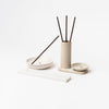 Various white  incense holders on a white background