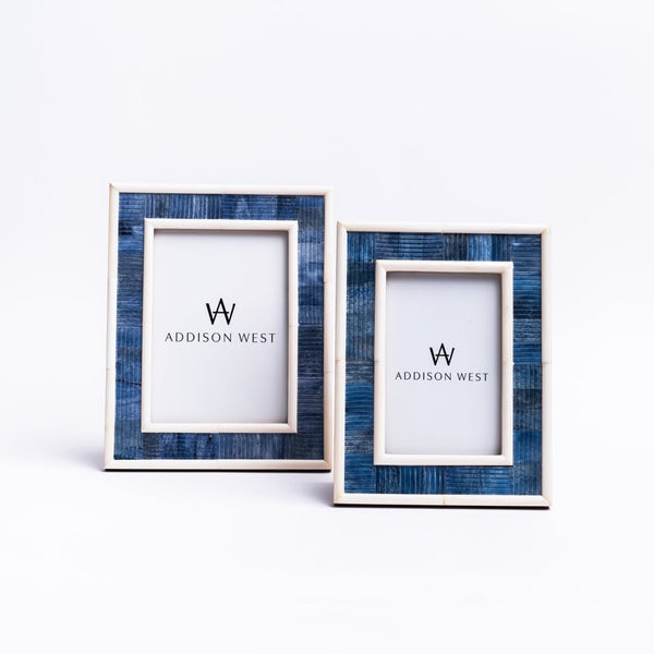 Set of two Zodax Capri Blue and white picture frames on a white background