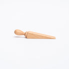 Small wood door wedge by Creamore Mill on a white background
