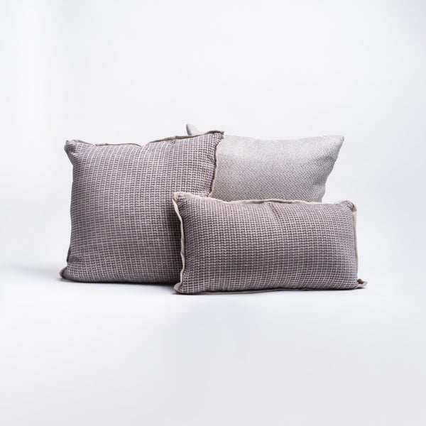 20" Square Blake Outdoor Throw Pillow In Light Gray with other outdoor pillowson a white background