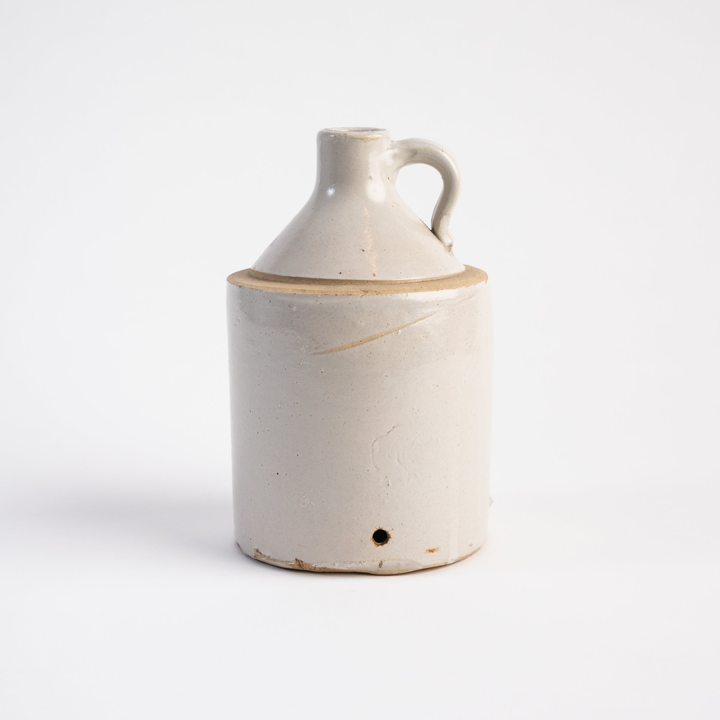 Vintage Small White Crock on a white background at Addison West