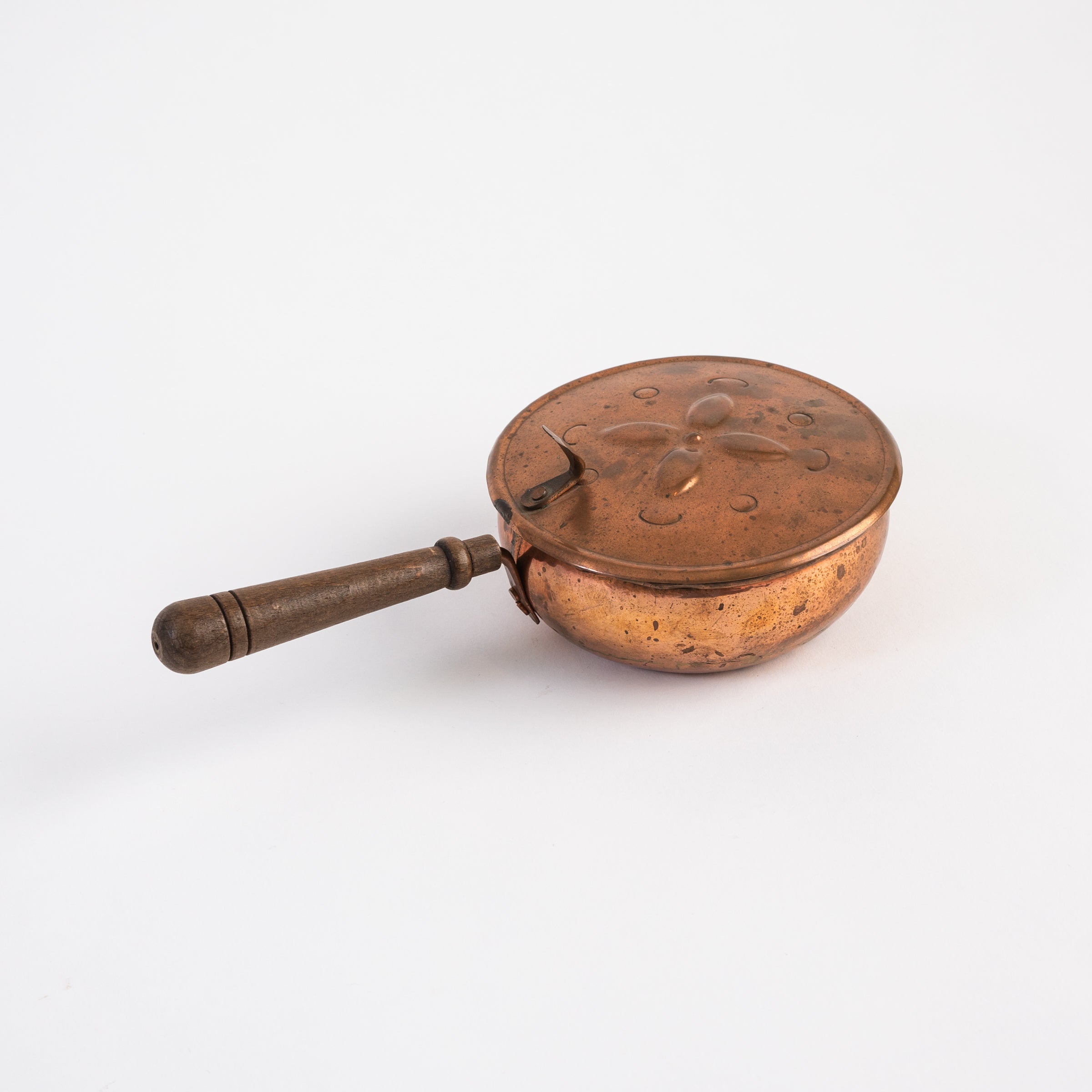 Vintage Copper Silent Butler on a white background at Addison West
