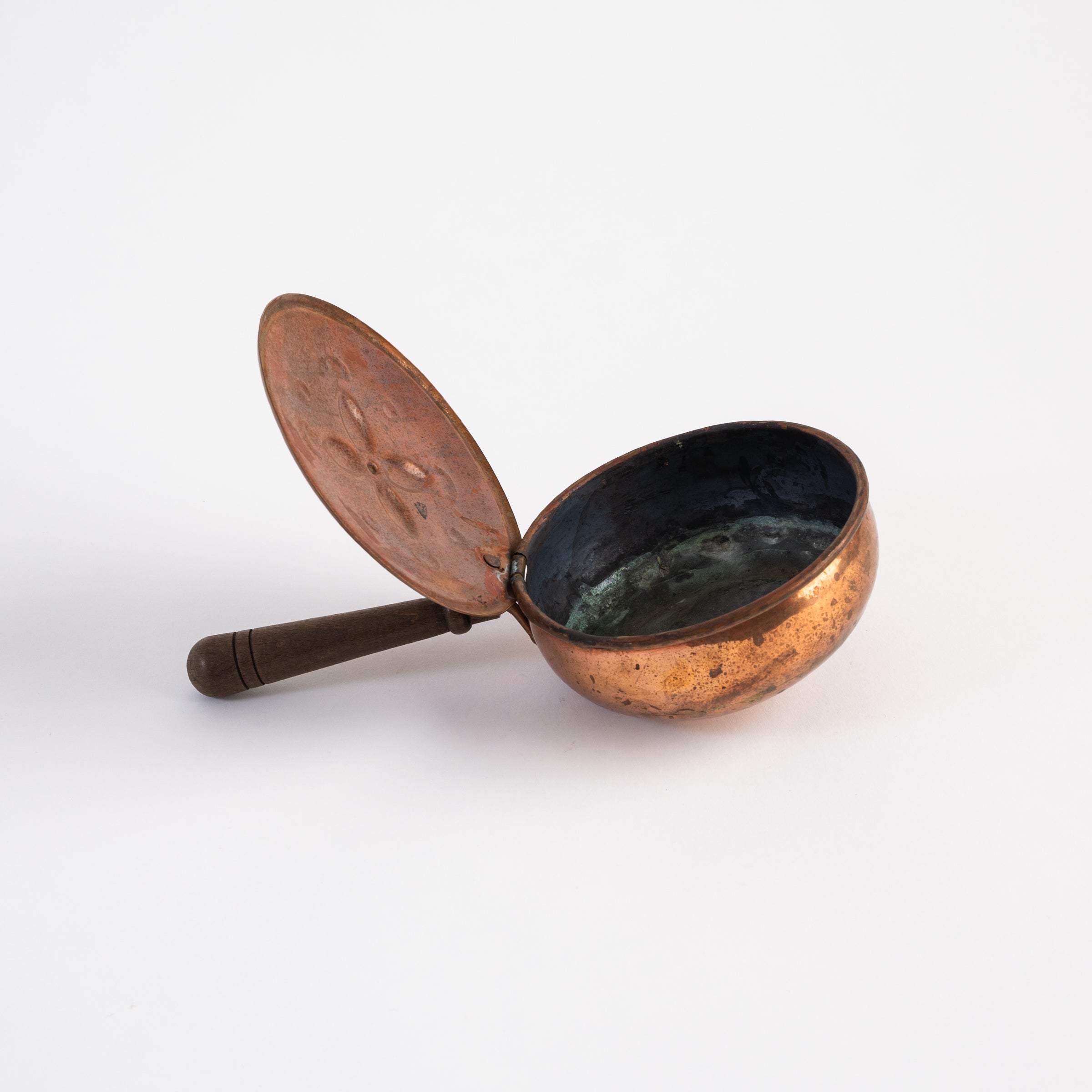 Vintage Copper Silent Butler on a white background at Addison West