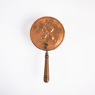 Vintage Copper Silent Butler on a white background at Addison West