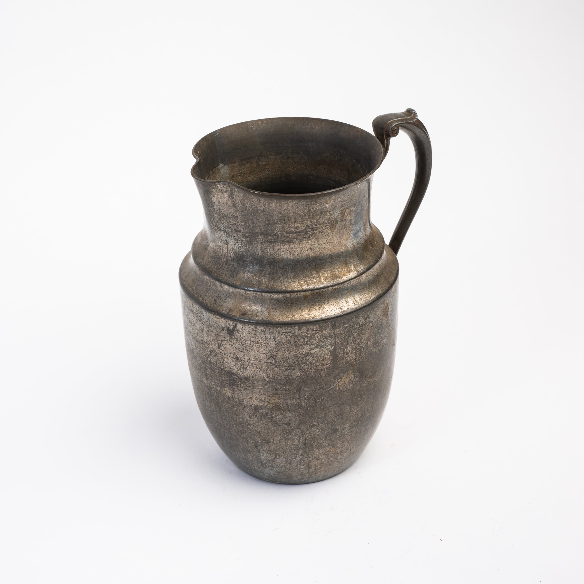 Vintage Pewter Pitcher on a white background at Addison West