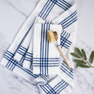 Farmhouse Napkin in Blue, Set of 4 on a kitchen counter at Addison West