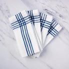 Farmhouse Napkin in Blue, Set of 4 on a kitchen counter at Addison West