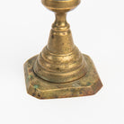 Close up of Vintage Brass Geometric Candlesticks on a white background at Addison West
