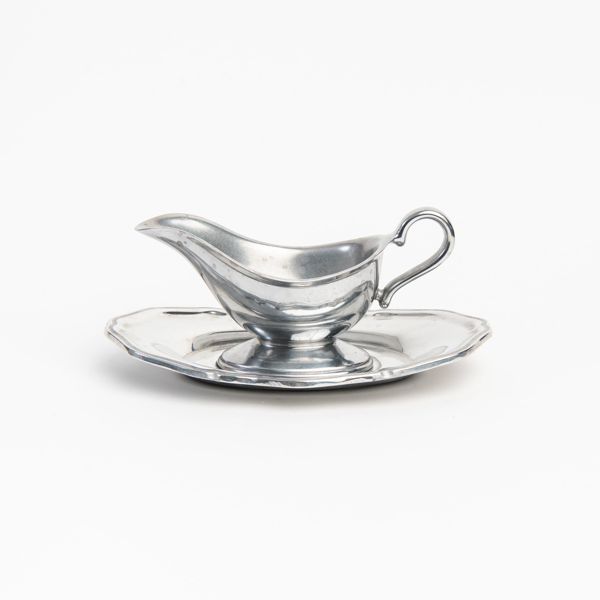 Vintage Wilton Pewter Gravy Boat on a white background at Addison West