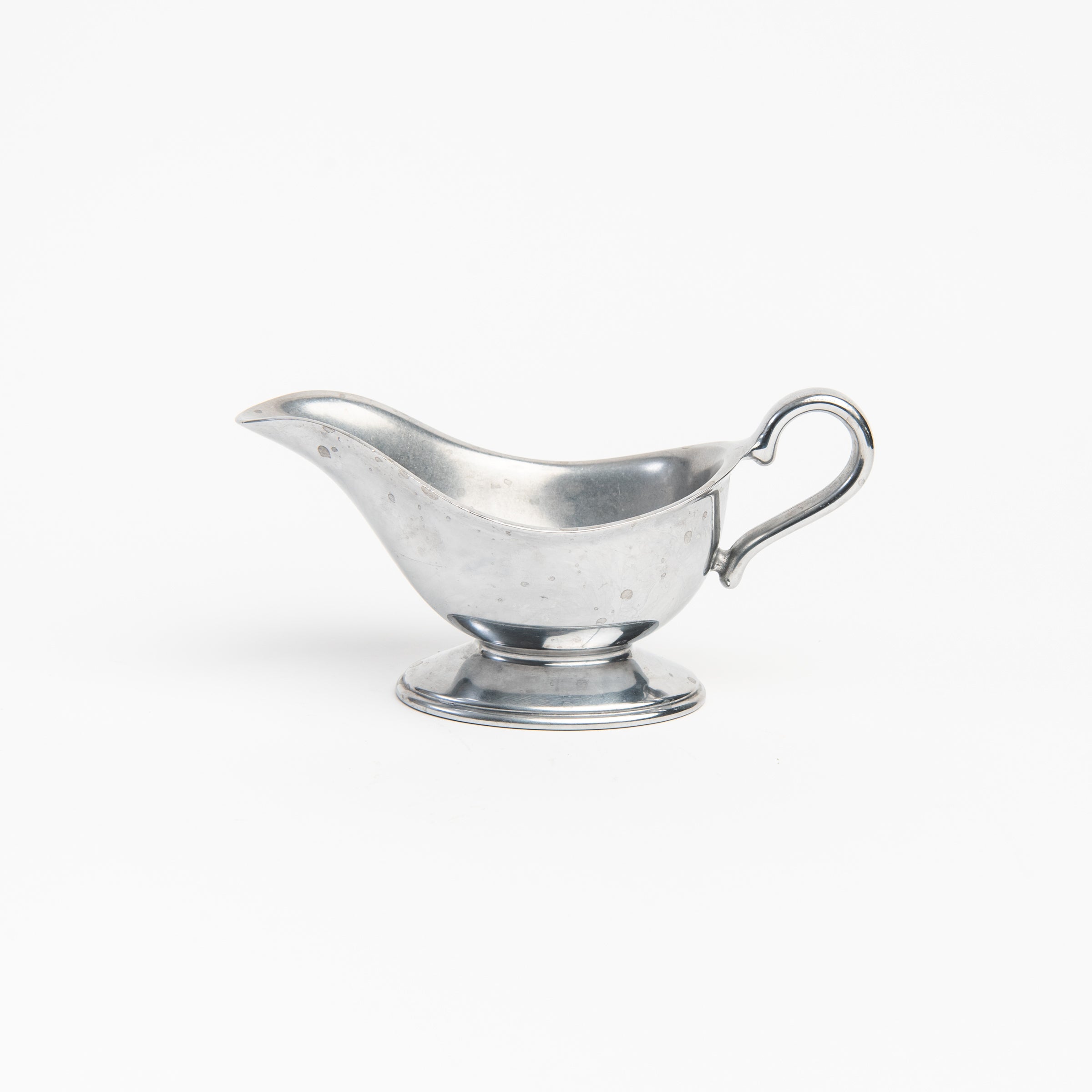 Vintage Wilton Pewter Gravy Boat on a white background at Addison West