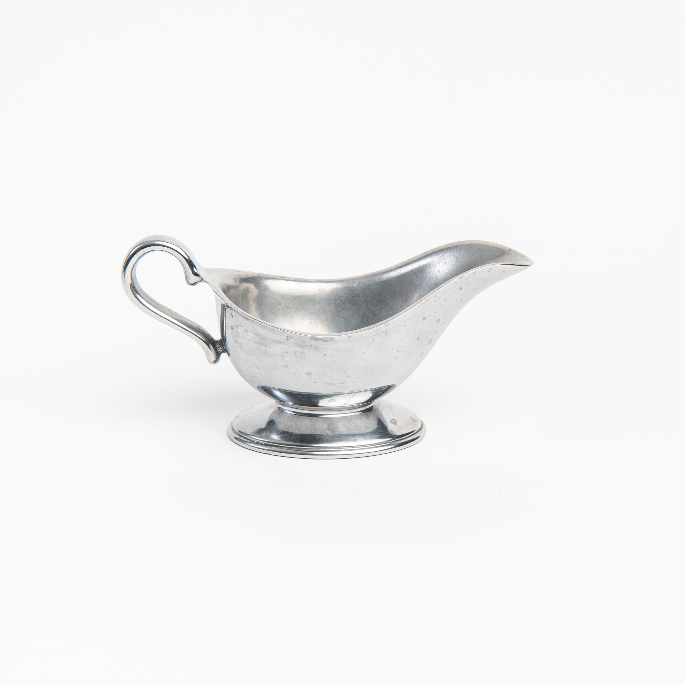 Vintage Wilton Pewter Gravy Boat on a white background at Addison West
