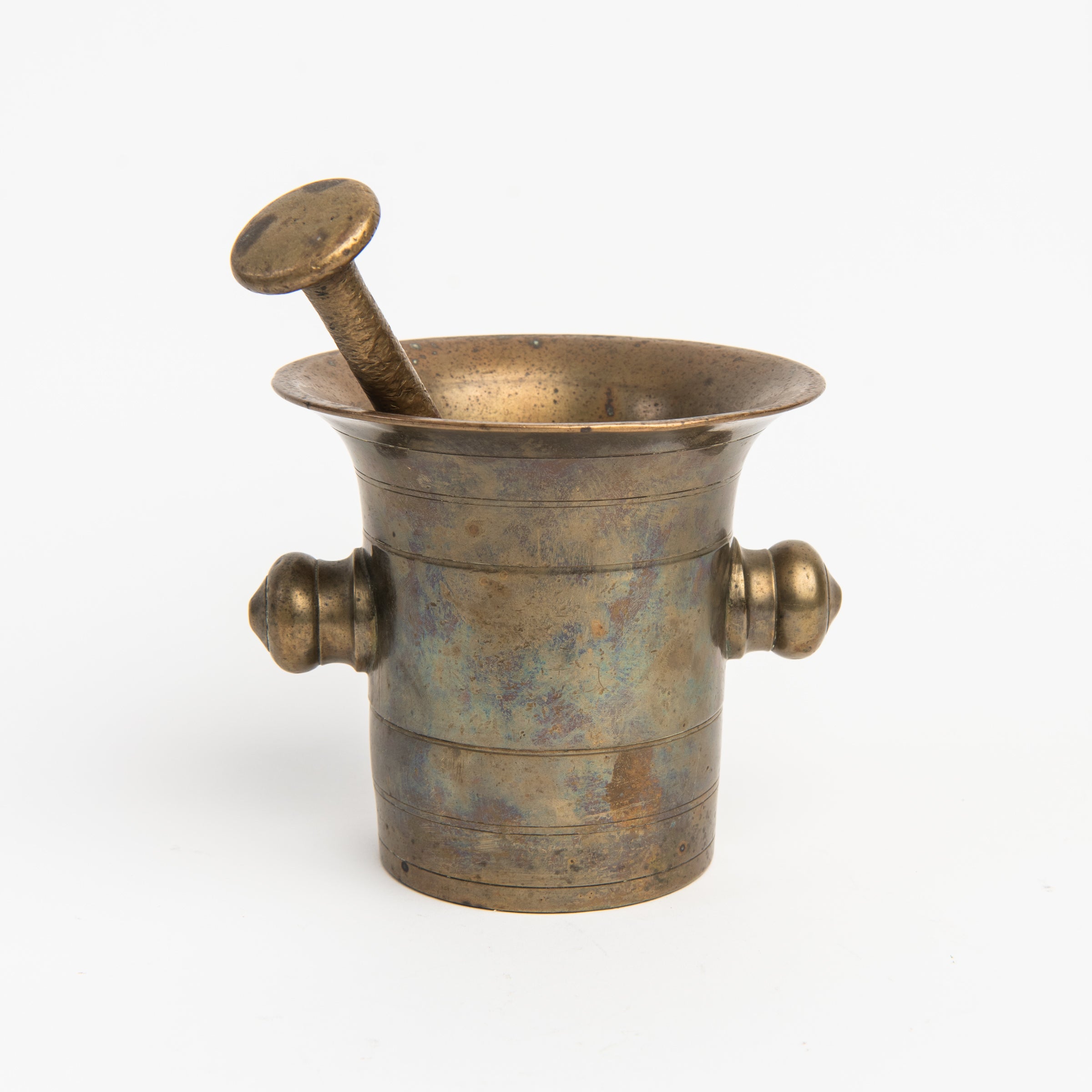 Vintage European Brass Mortar and Pestle c. 1780-1850 on a white background at Addison West