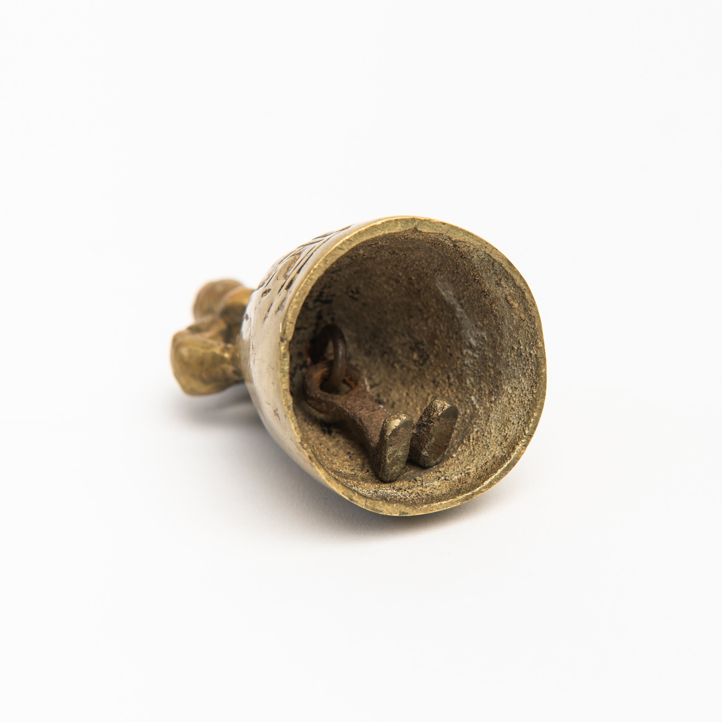 Vintage Brass Lady Bell on a white background at Addison West