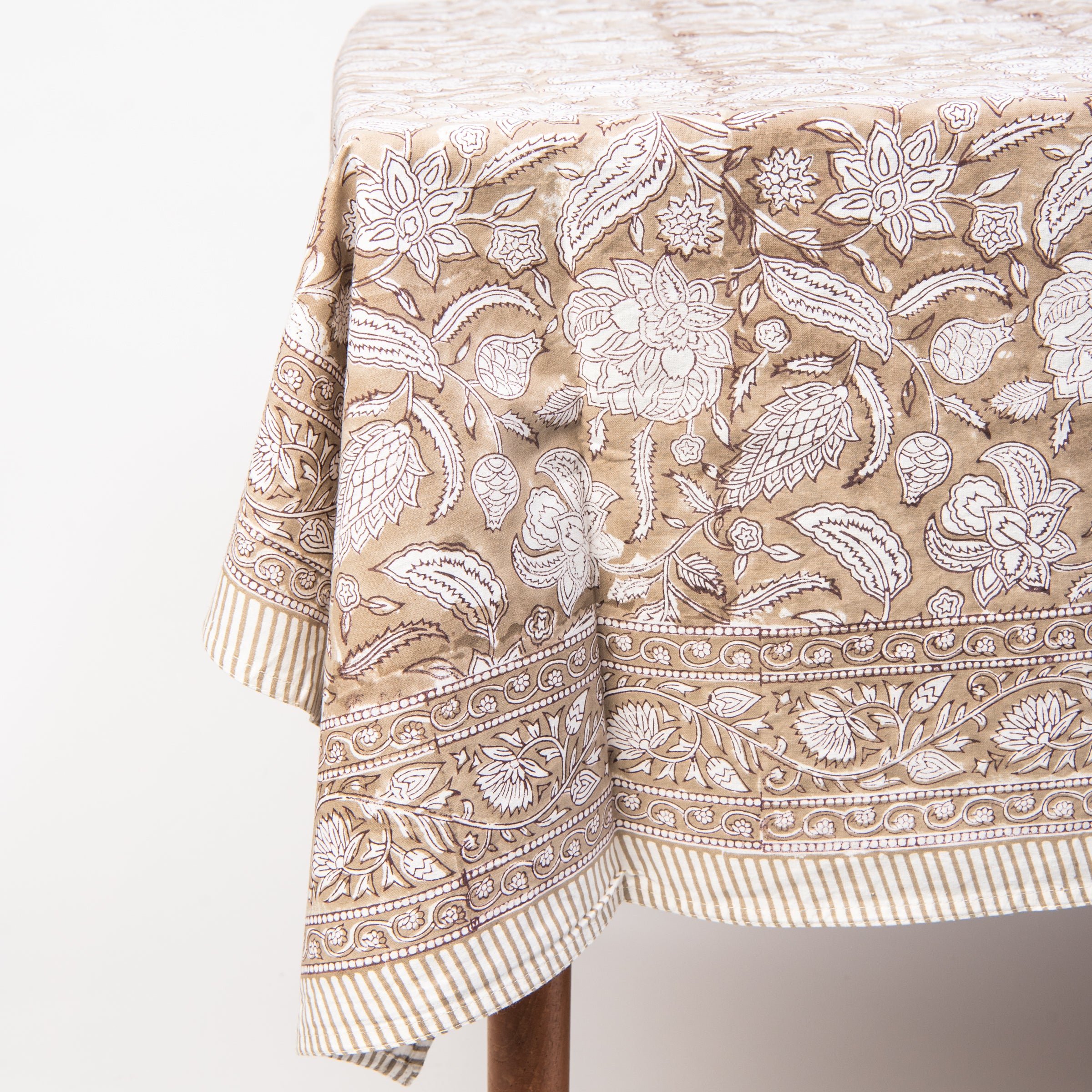 Sable Block Print Tablecloth on a table on a white background at Addison West